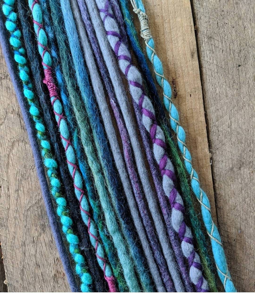 Single-Ended Wool Dreadlock Extensions. Made To Order. Custom Details. Mixed Cool Colors. Blue. Green. Purple. Wrapped. Price is per dread