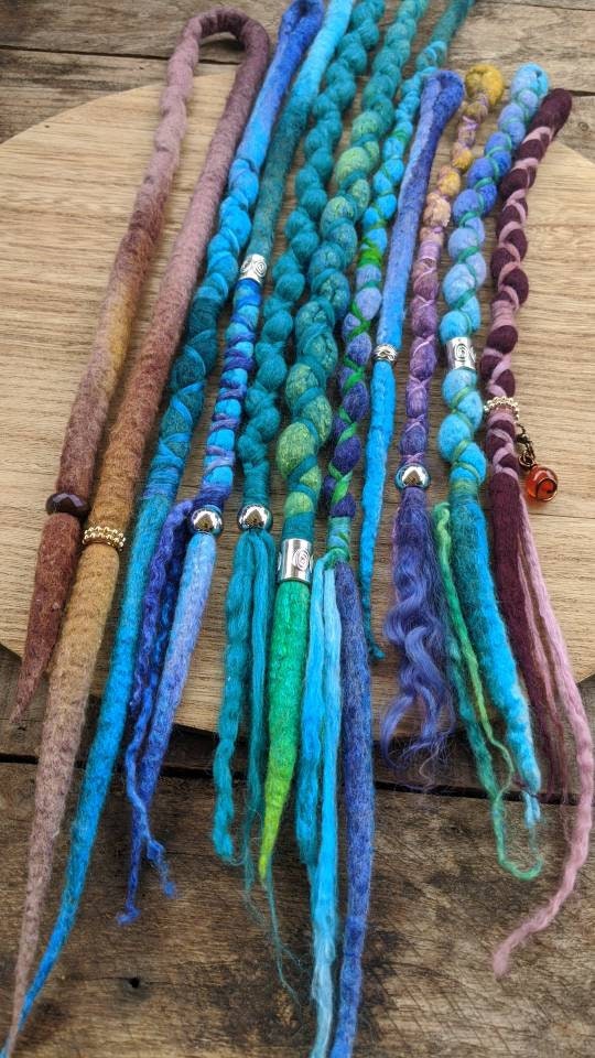 Single-Ended Wool Dreadlock Extensions. Made To Order. Custom Details. Mixed Cool Colors. Blue. Green. Purple. Wrapped. Price is per dread