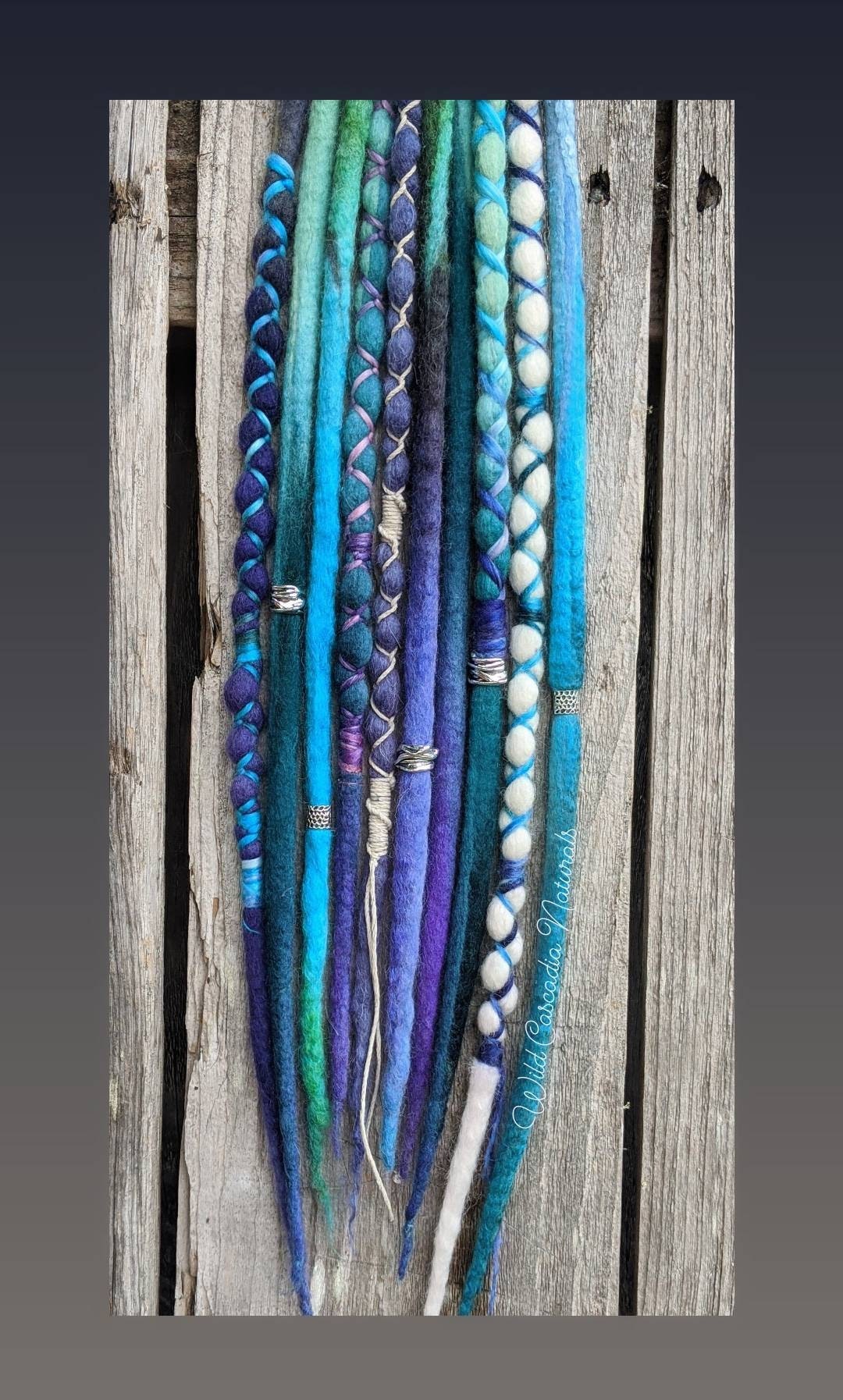 Single-Ended Wool Dreadlock Extensions. Made To Order. Custom Details. Mixed Cool Colors. Blue. Green. Purple. Wrapped. Price is per dread